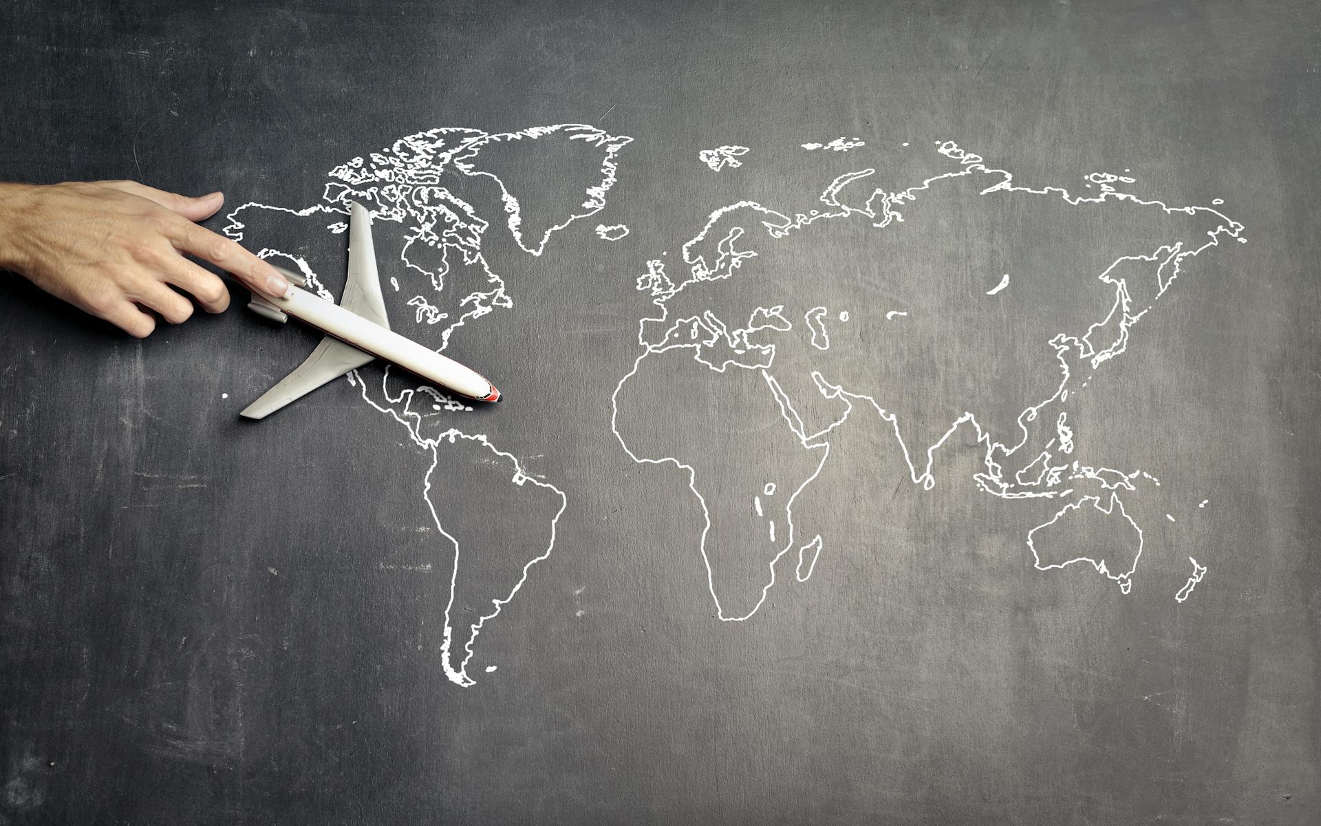 Woman wearing contemporary British womenswear — dresses and tailoring, Jade Crest